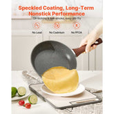 Nonstick frying pan flipping crepe, highlighting speckled coating and PFOA-free performance from skillet set.