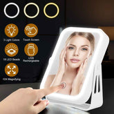 Lighted mirror with touch screen control, USB rechargeable feature, and 10x magnifying power.