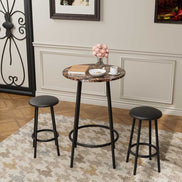 Stylish 3-Piece Bar Table Set with 2 Stools in a modern interior, featuring a round faux marble tabletop and black stools for space-saving dining.