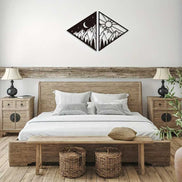 Metal celestial wall art with mountain, moon, and sun design for modern home decor