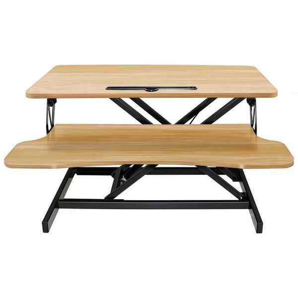 Front view of 32 inch height adjustable desk converter with spacious dual-tier surface for dual monitors and keyboard placement.