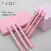 Peach pink beginner makeup brush set with soft bristles, ideal for eyeshadow and powder application, displayed with case.