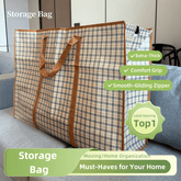 Plaid storage bag with brown straps on a couch, labeled as a must-have for home organization.