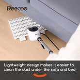 A Reecoo cordless floor cleaner is shown being used to clean a white and gray chevron-patterned rug underneath a light gray sofa on a light wood floor. A dark gray banner at the bottom features product text and an orange curved accent.