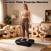Vibration plate exercise machine in living room with woman exercising