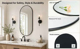 Bathroom vanity with round mirror, light fixture, and decorative elements on a white wall.