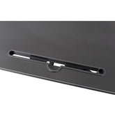 Close-up of cable management slot on adjustable height laptop desk, offering organized workspace functionality.