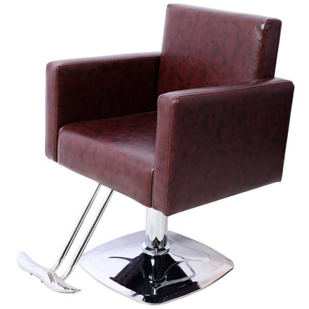 Salon chair in brown PU leather with ergonomic design and chrome hydraulic base, perfect for barber and beauty salon use.