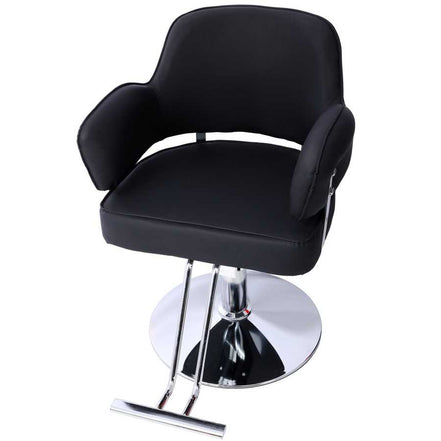 Salon Styling Chair for Hair Stylists with black upholstery and chrome base, designed for comfort and durability in salons.