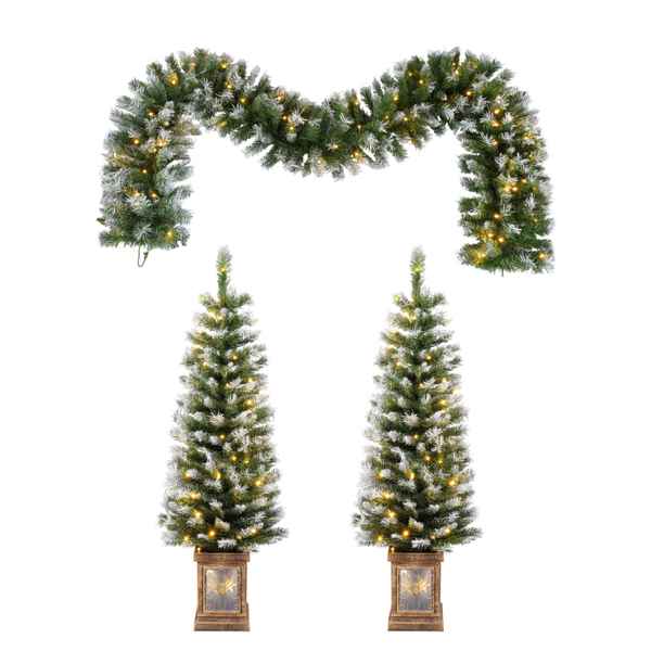 Decorative Christmas garland and trees with lights on a white background