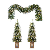 Decorative Christmas garland and trees with lights on a white background