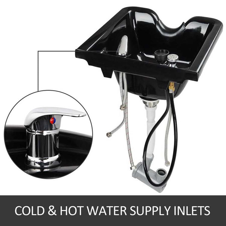 Black ceramic sink with cold and hot water supply inlets on a white background