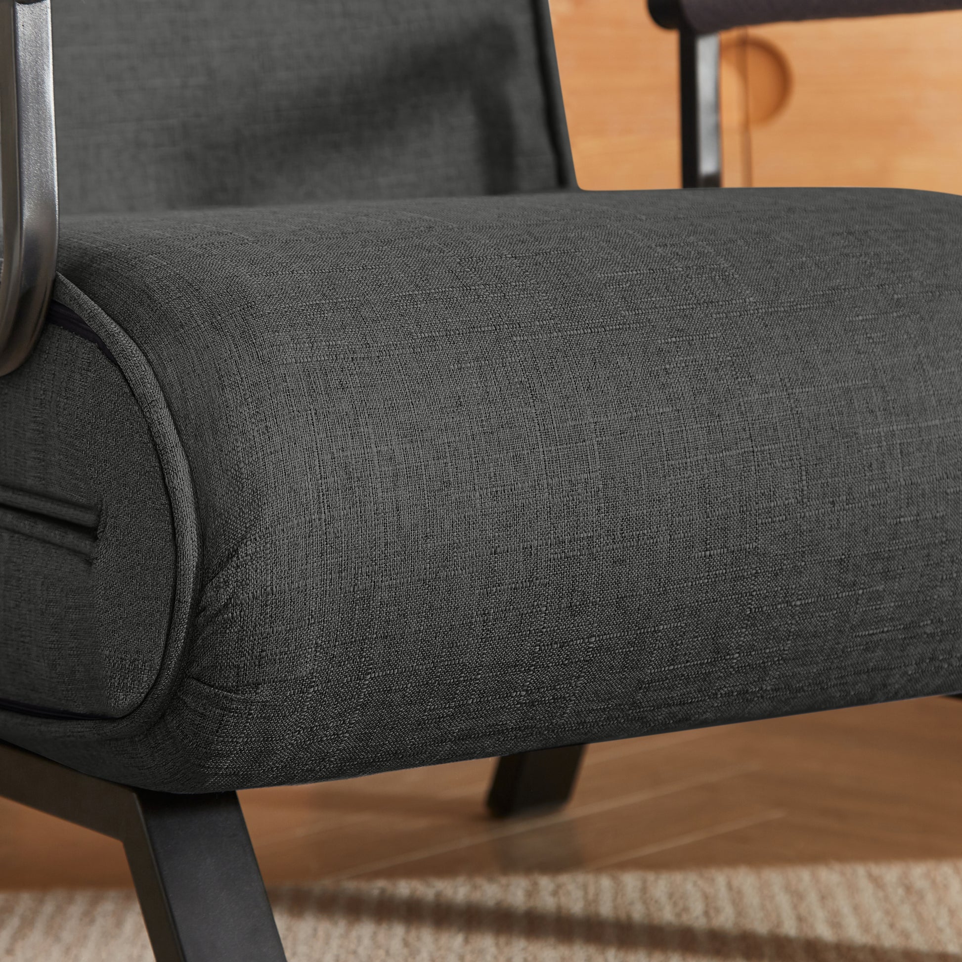 Textured black linen upholstery on the Folding Chair Bed, highlighting premium fabric quality and modern aesthetic.