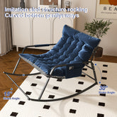 Blue rocking chair with curved bottom in a room setting