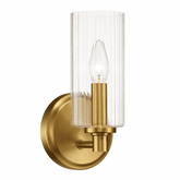 Gold wall sconce with clear glass shade on a white background