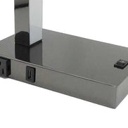 Close-up of LED Desk Lamp base showing USB port, power outlet, and on/off switch, highlighting modern convenience and utility.