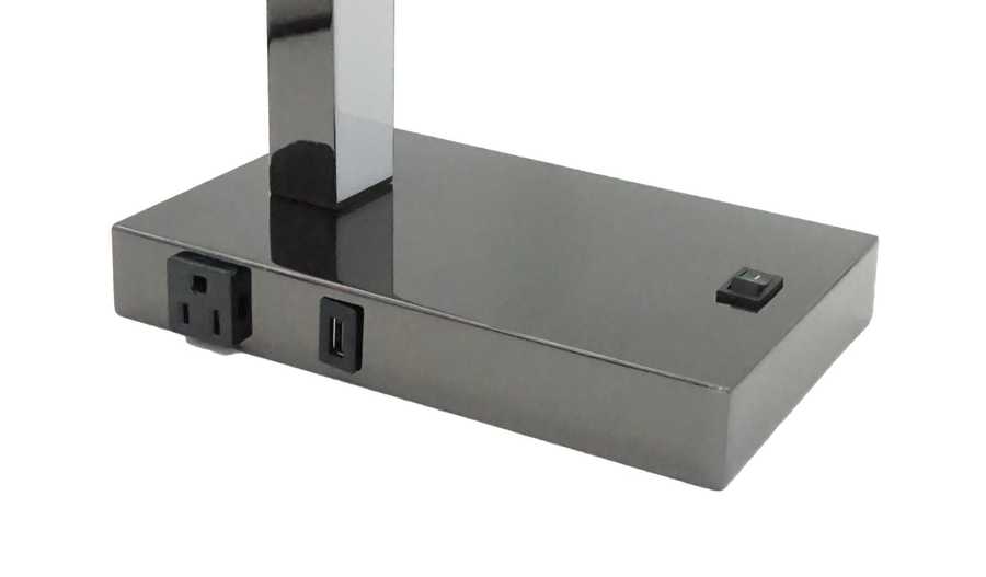 Close-up of LED Desk Lamp base showing USB port, power outlet, and on/off switch, highlighting modern convenience and utility.