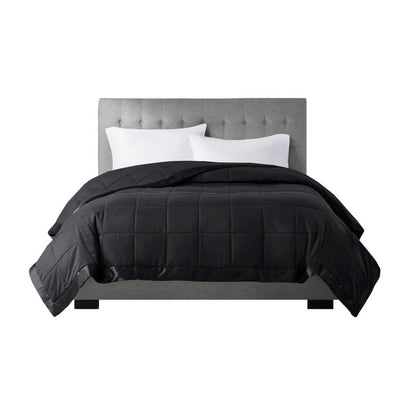 Front-facing view of black Lightweight Down Alternative Blanket on a bed, ideal for twin size bedding in contemporary home decor.