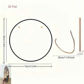Measurement diagram showing a round decorative piece labeled 10cm/3.9 inches in diameter, with two small gold dots, a curved brown strip 30cm/11.
