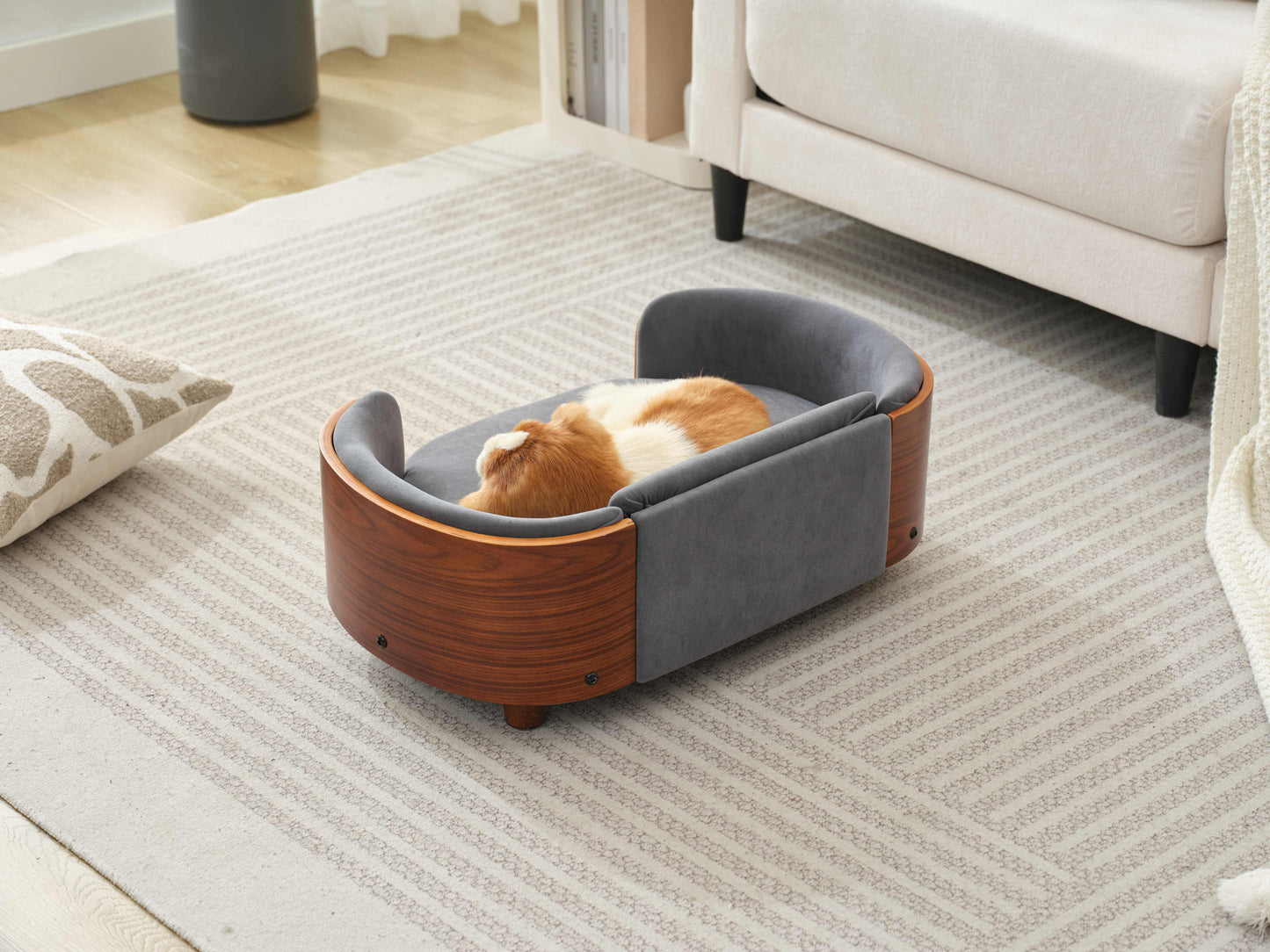 Orthopedic small pet sofa with curved solid wood frame and plush velvet cushion, perfect for Scandinavian-style interiors.