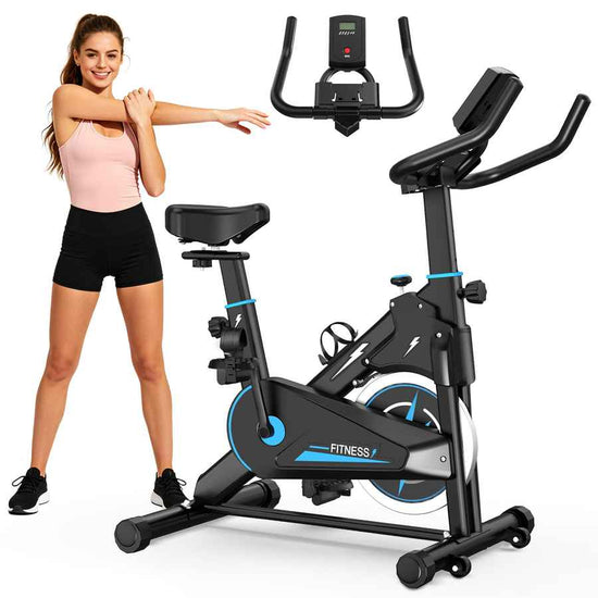 Black indoor exercise bike with adjustable resistance, digital display, and ergonomic handlebars for home fitness.