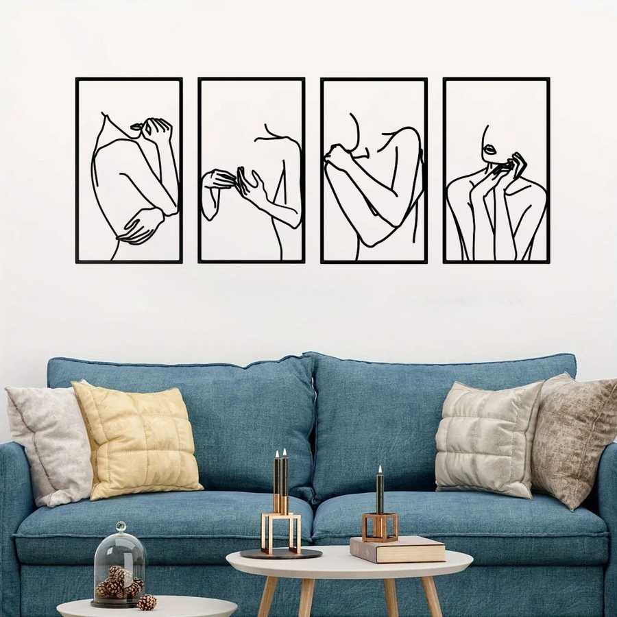 Black line art of women on wall in living space