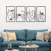 Black line art of women on wall in living space