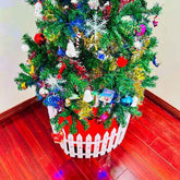 Christmas tree ornaments and white guardrail close-up