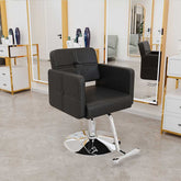 Black salon chair with adjustable height in modern salon