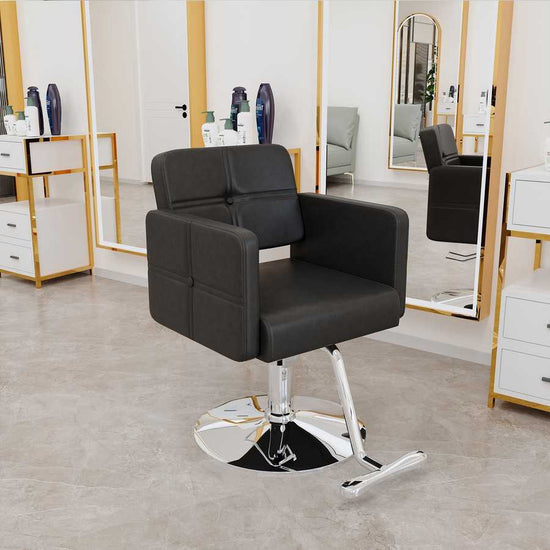 Black salon chair with adjustable height in modern salon