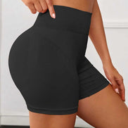 Women's black high waist butt lift leggings with tummy control. Stretchy yoga shorts perfect for gym and casual workouts.