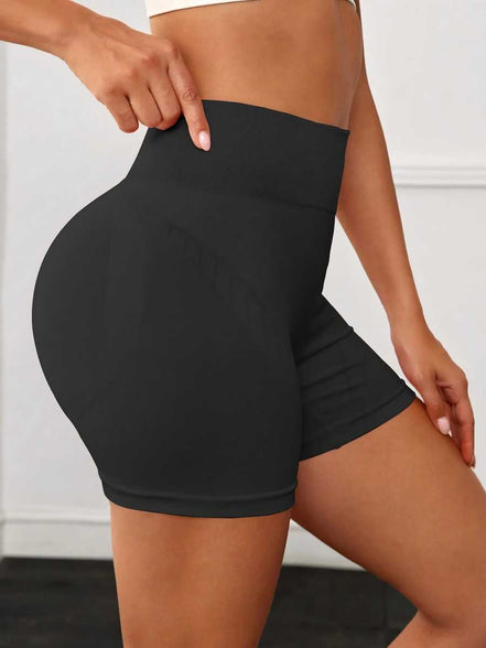 Women's black high waist butt lift leggings with tummy control. Stretchy yoga shorts perfect for gym and casual workouts.