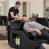 Barber washing station with shampoo and conditioner bottles