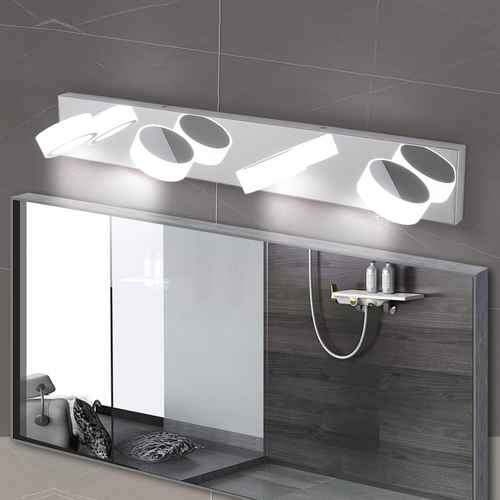 Bathroom mirror with modern light fixture on a tiled wall
