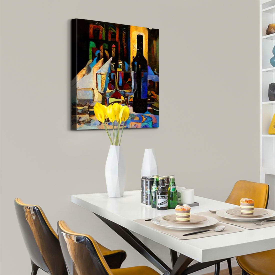 a dining room table with yellow chairs and a painting on the wall