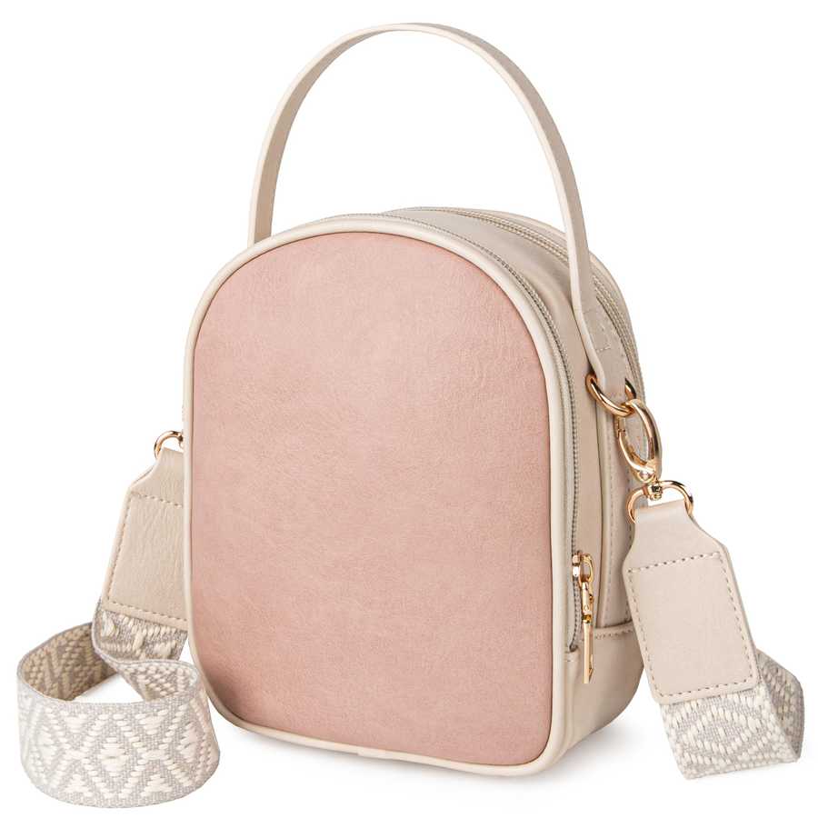 Pink crossbody bag with beige strap on a white background