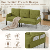 Green sofa with double side pockets for storage in a living room setting.