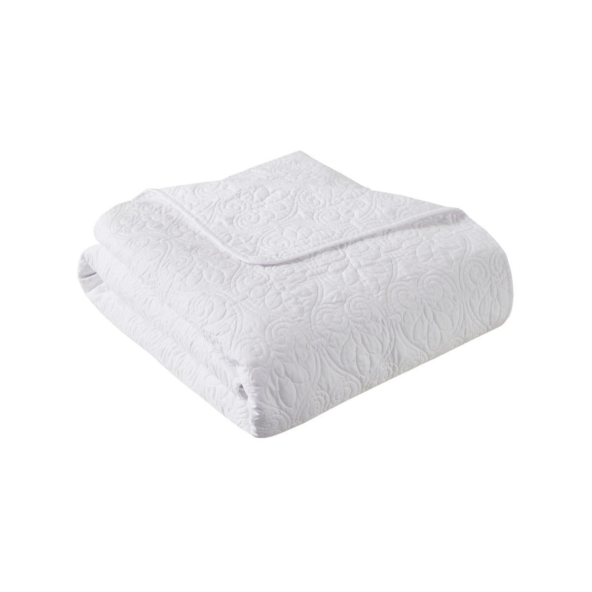 Folded white oversized quilted throw 60x70 made from soft cotton, perfect as a bed comforter for cozy and stylish home décor.