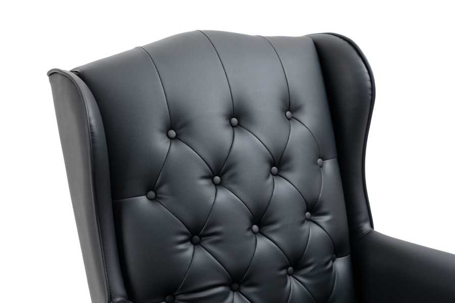 Black leather armchair with tufted backrest on a white background