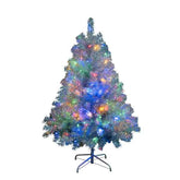 A pre-lit artificial Christmas tree with silver-blue needles and multicolored lights, standing on a black metal stand against a plain white background.