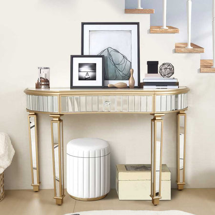 Half-Moon Mirrored Console Table styled under staircase with framed art and modern decor, ideal for compact entryway spaces.