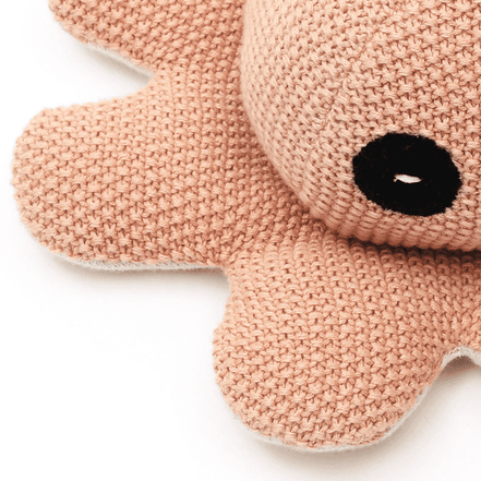 Pink knitted octopus plush toy with black eyes, soft baby-friendly stuffed animal