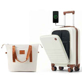 A cream-colored carry-on suitcase with brown handles and trim, shown open with its telescoping handle extended and a phone charging from an integrated port. A matching cream tote bag with brown handles is displayed beside it on a clean white background.