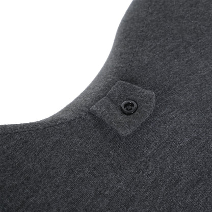 Close-up of button attachment on Ergonomic Memory Foam Bed Pillow for Spinal Support, highlighting adjustable headrest feature for added support.