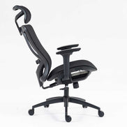 Reclined side view of high back mesh office chair showing tilt mechanism, adjustable armrests, and ergonomic seat design.
