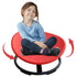 Child sitting on a red balance chair with arrows indicating movement