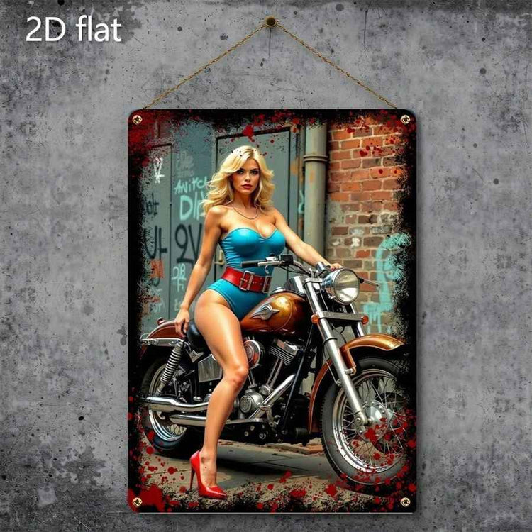 A rectangular wall art print hanging on a gray concrete wall, showing a blonde woman in a turquoise bikini sitting on a brown motorcycle in an urban alley. The print has distressed red and black edges and the text &