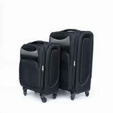 Two black suitcases of different sizes on a white background