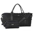 Black quilted duffel bag with matching travel pouch on a white background
