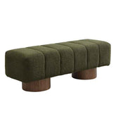 Green upholstered bench with wooden legs on a white background